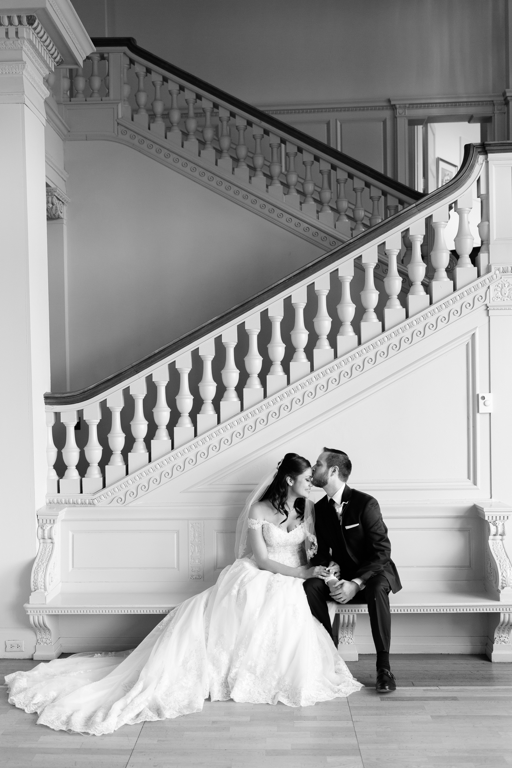 Bride and Groom portrait on grand staircase in Cairnwood Estate